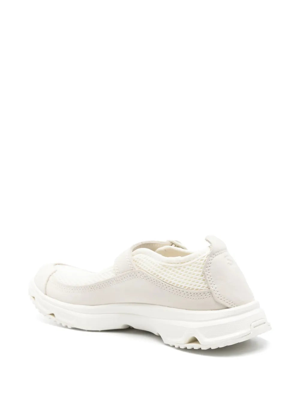 White slip-on sneaker, back/side view, padded collar and textured tread sole