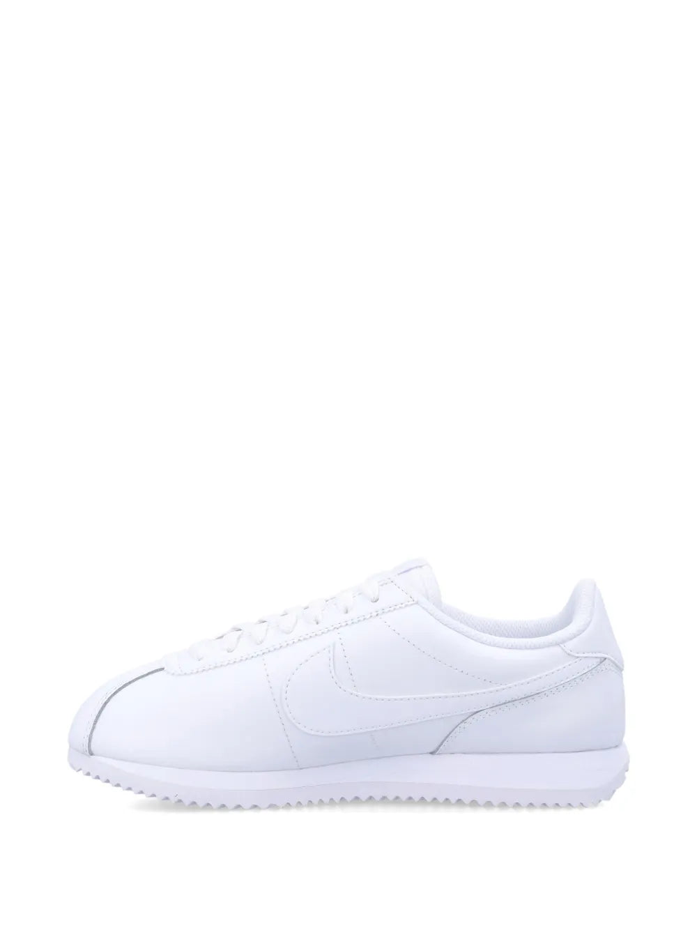White low-top sneakers with smooth leather upper and stitched toe