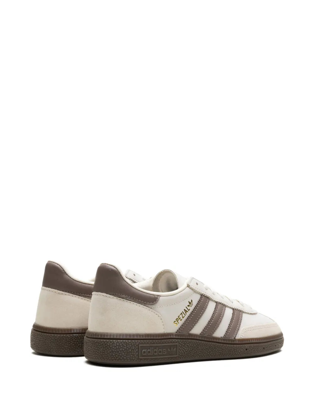 Beige adidas sneakers pair, low-top lace-up design with three stripes