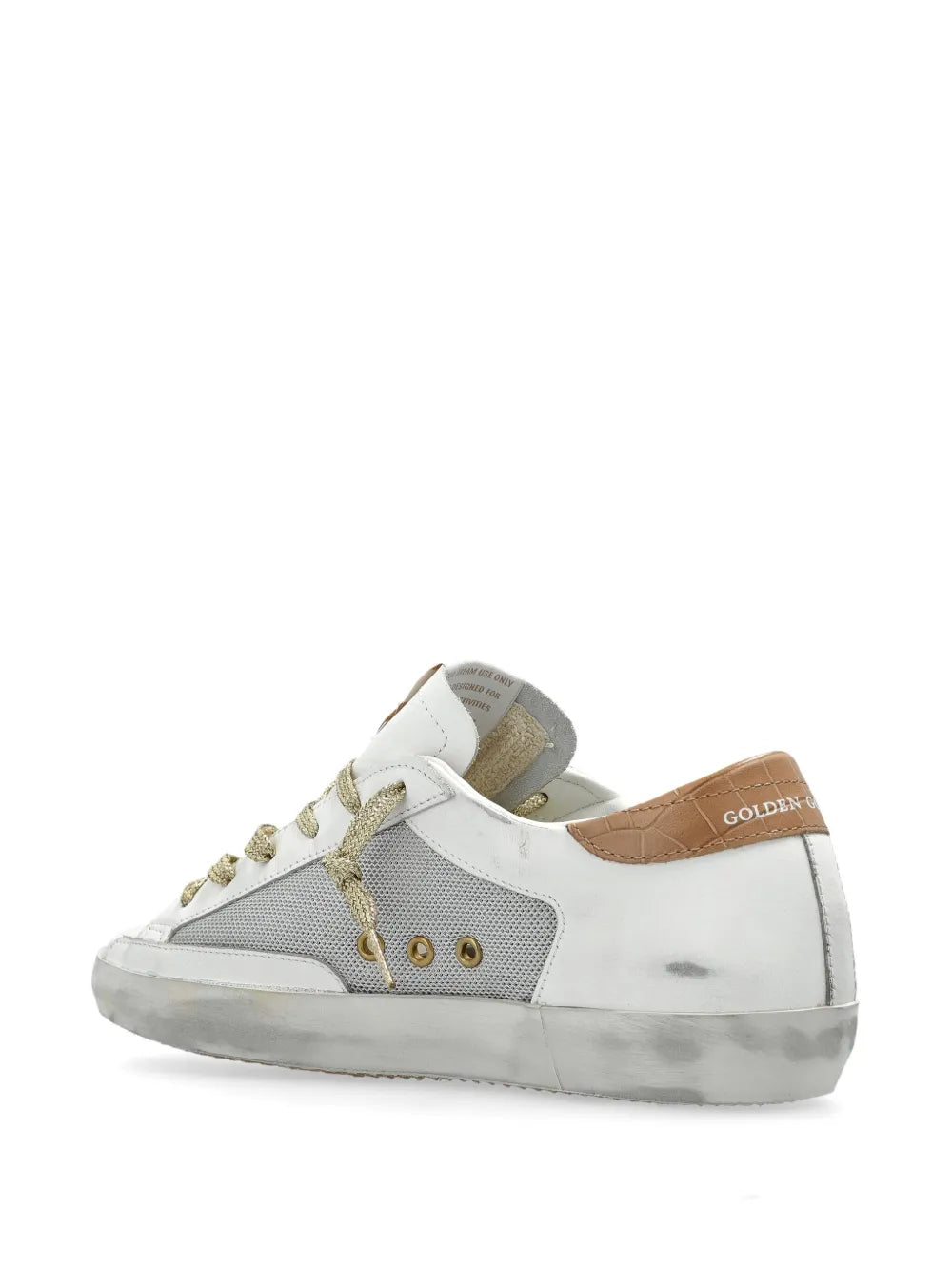 White leather low-top sneakers with gold laces, rear heel tab, and side panel