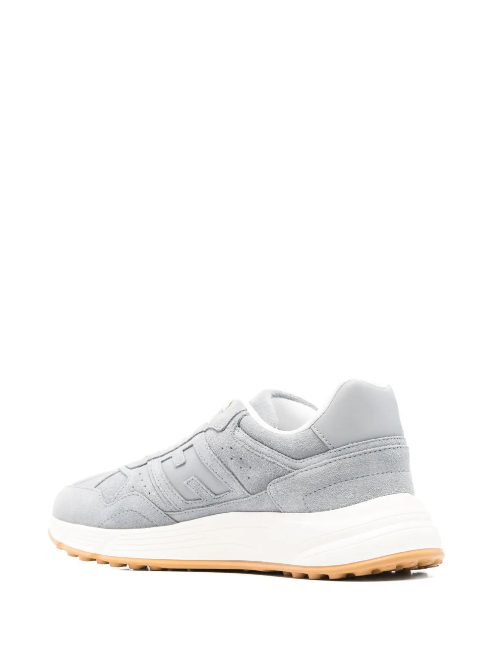 Light blue low-top sneakers with padded heel collar and orange outsole