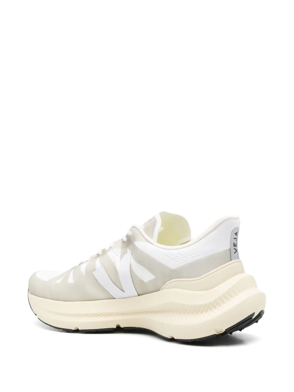 White lace-up sneaker, side view with molded heel and chunky midsole