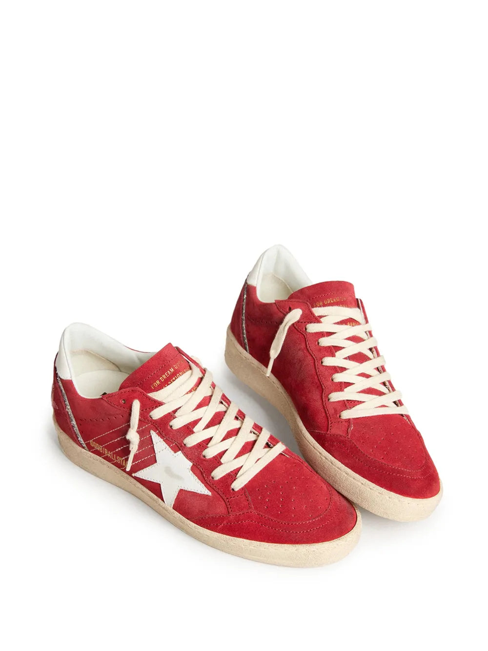 Pair of red Golden Goose Ball Star sneakers with white star detail and tan soles