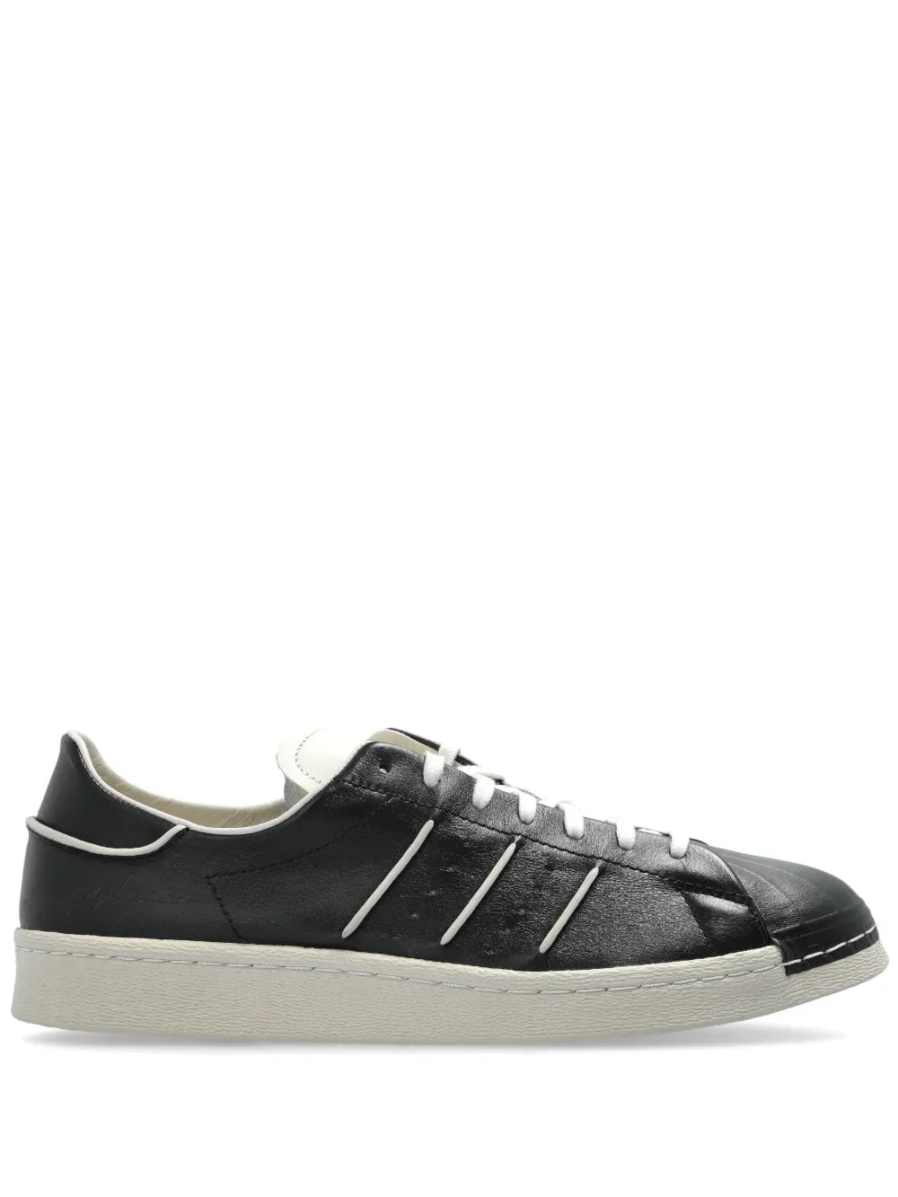 Y-3 Superstar black low-top sneakers, white midsole, three stripe panels