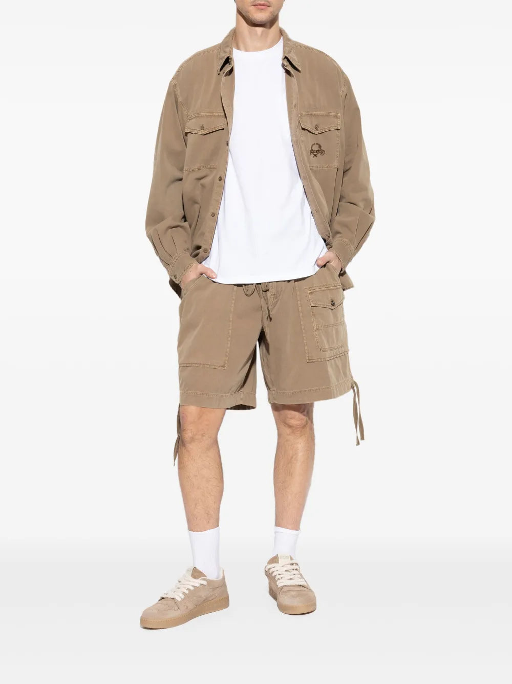 Light brown suede sneakers worn with white socks