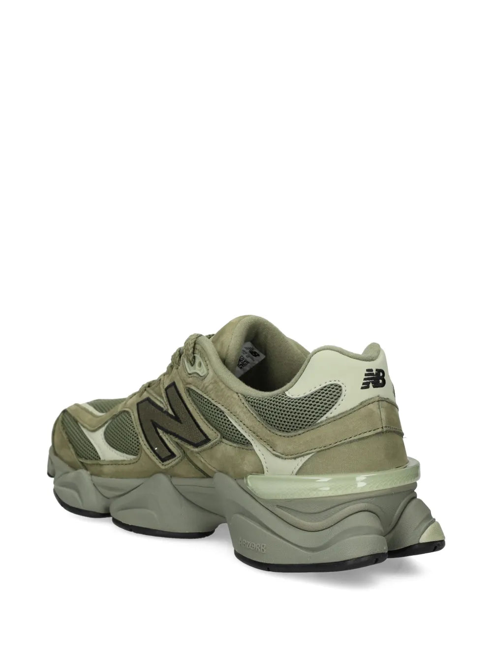 Green lace-up athletic sneakers with textured mesh and layered cushioned sole