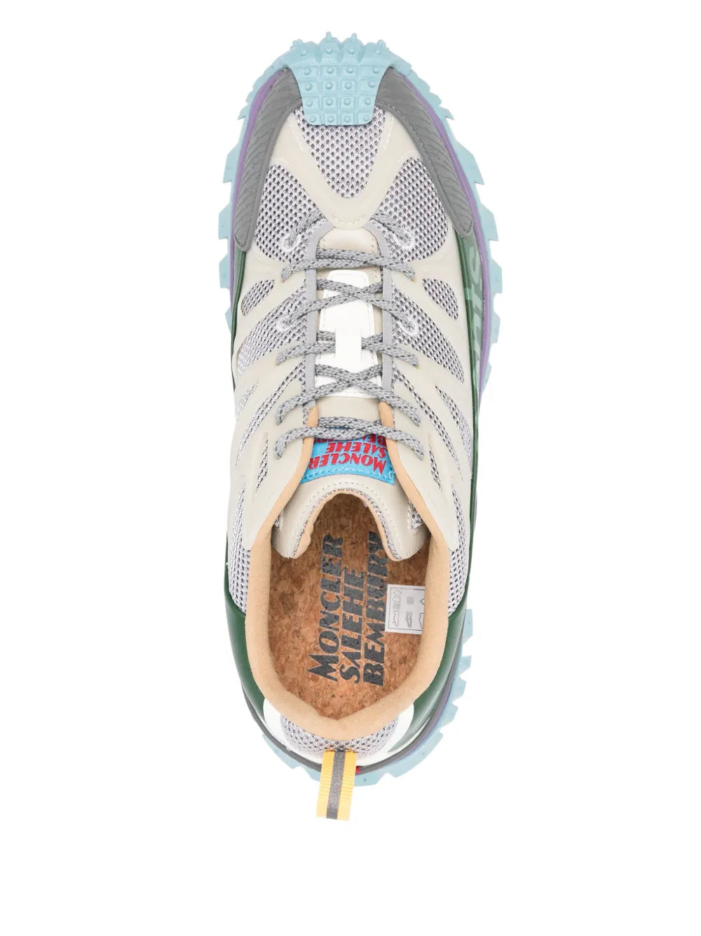Front view trail sneakers with lace-up mesh, green lining, and teal rubber sole