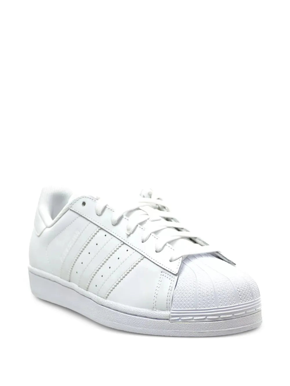 White leather low-top sneakers, side angle, lace-up with three-bar stripes