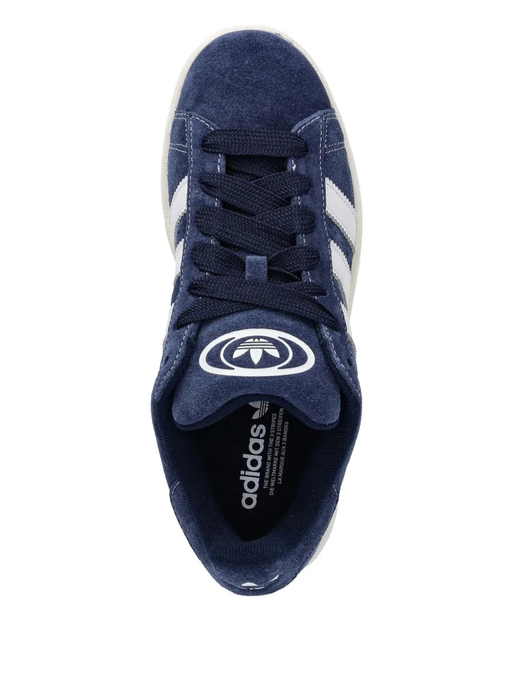 Blue sneaker tongue with adidas logo, black lace-up, and rounded toe