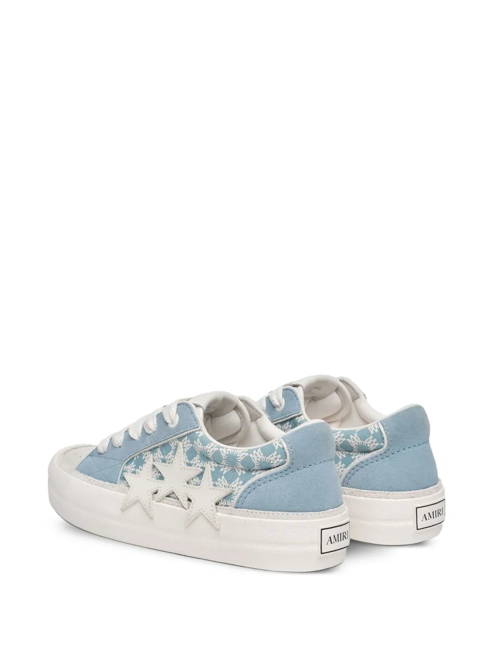 Light blue low-top skate trainers with star side embroidery and rear heel tag