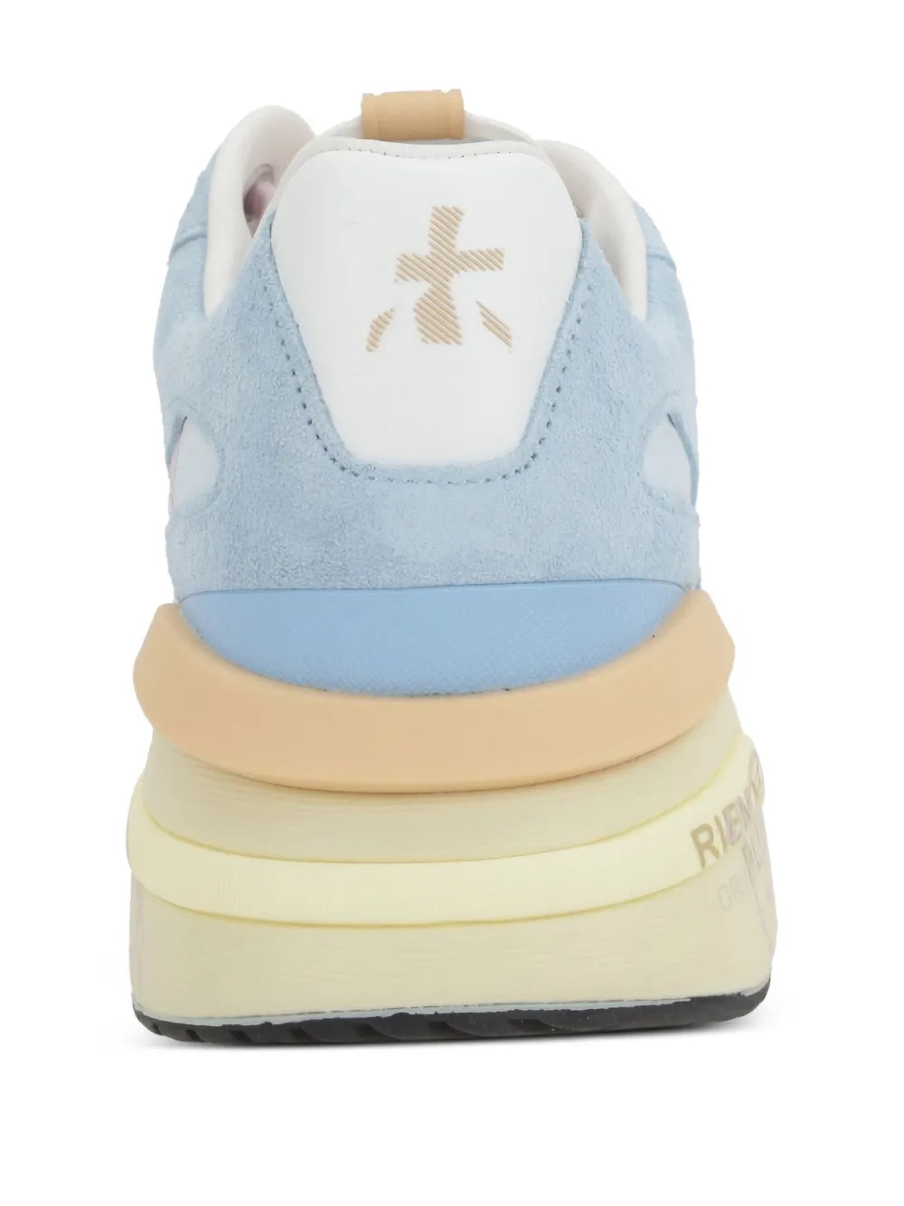 Light blue low-top sneakers with heel panel and white back logo patch