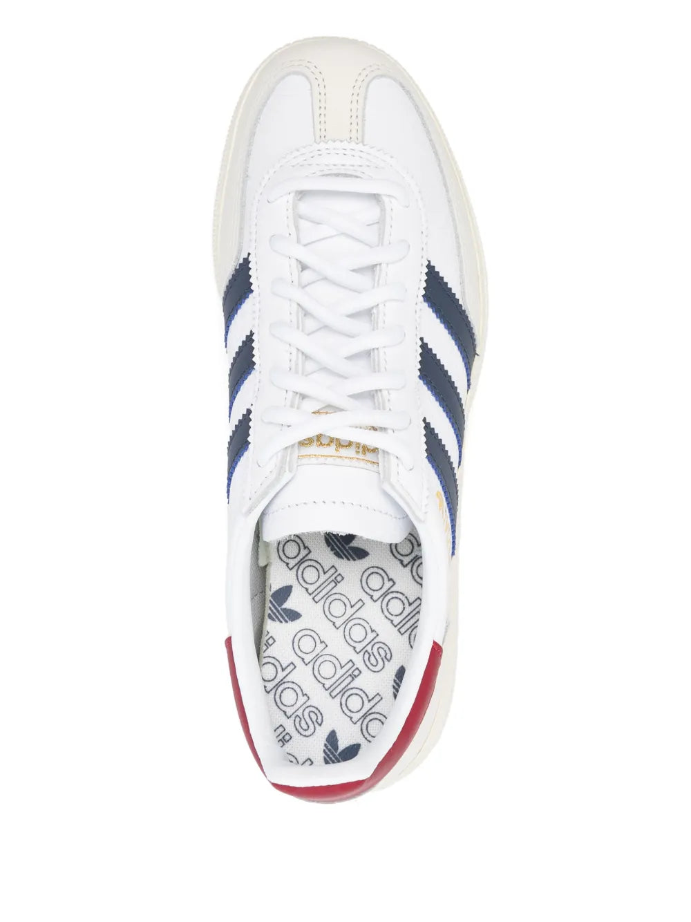 White sneaker interior view with repeating adidas logo lining, red heel, lace-up upper