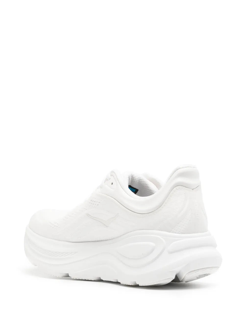 White HOKA running shoe side and heel profile with rounded rocker-style midsole