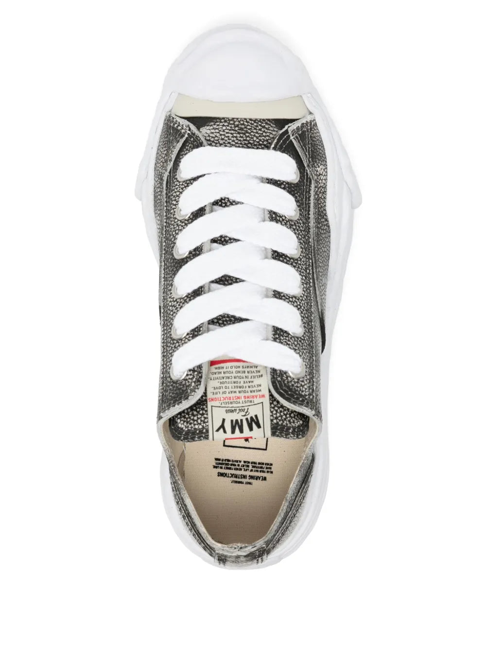 Black leather low-top sneakers, front view, white laces and tongue logo patch