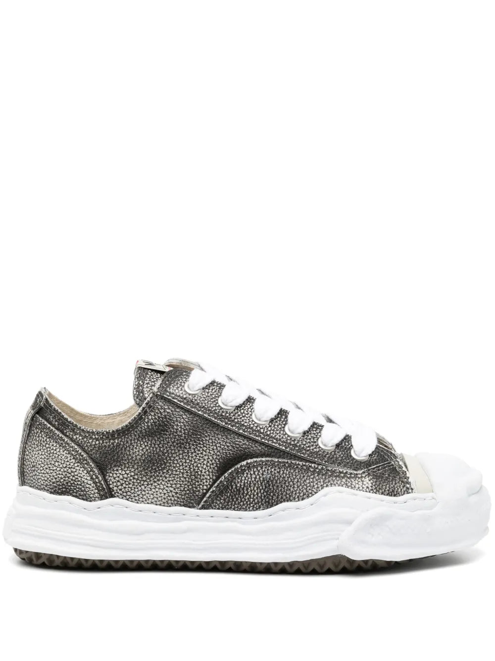 Black leather low-top sneakers with white laces and textured metallic upper