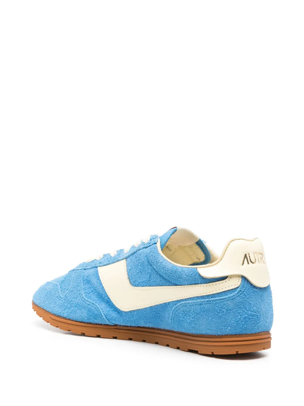 Pacific blue sneakers with cream heel logo patch and gum sole