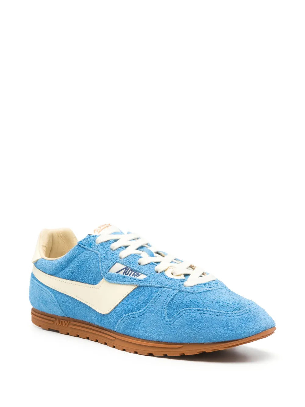 Pacific blue low-top sneakers with cream overlay, white laces, and gum outsole