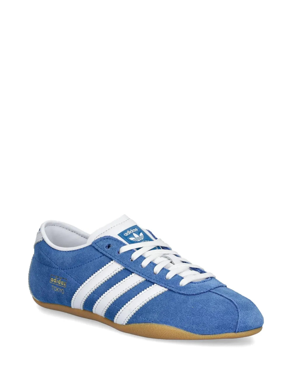 Blue low-top adidas Tokyo sneakers with white stripes and lace-up closure