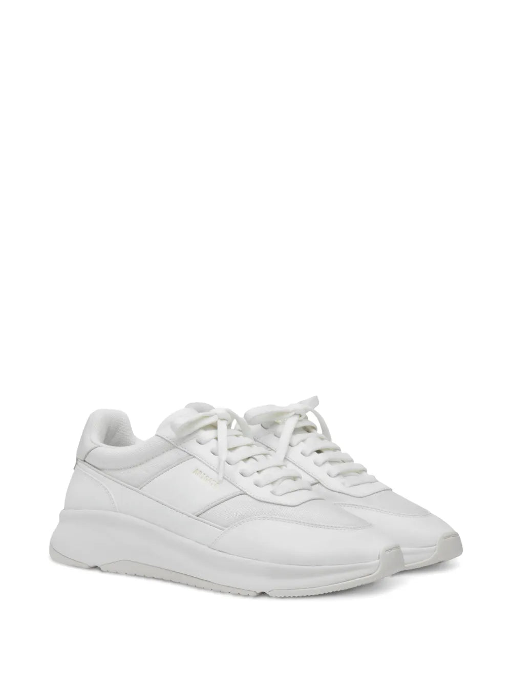White lace-up running sneakers angled view with cushioned rubber sole