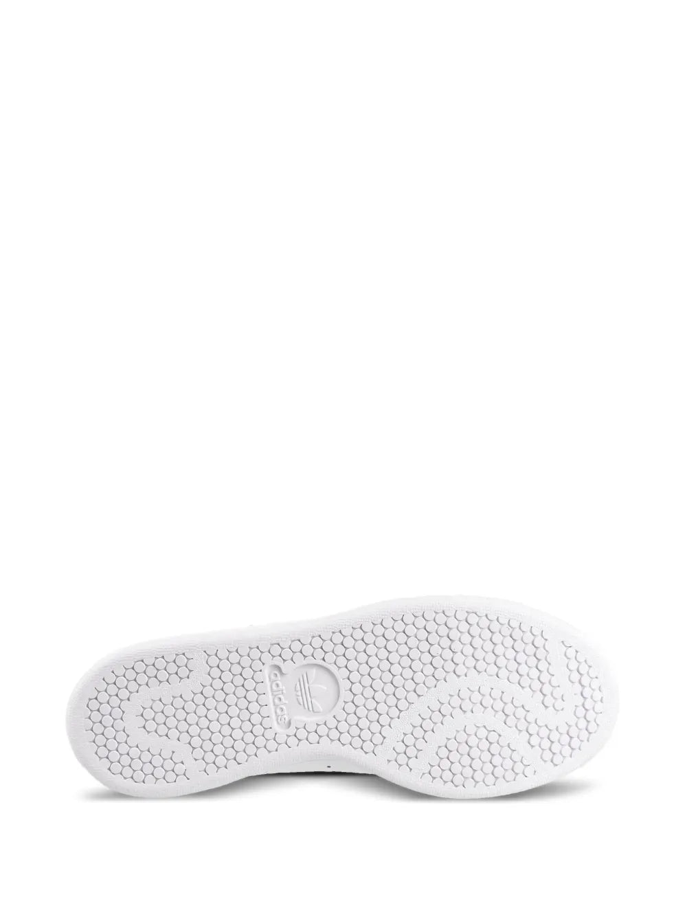 White rubber outsole with textured tread and adidas logo at center