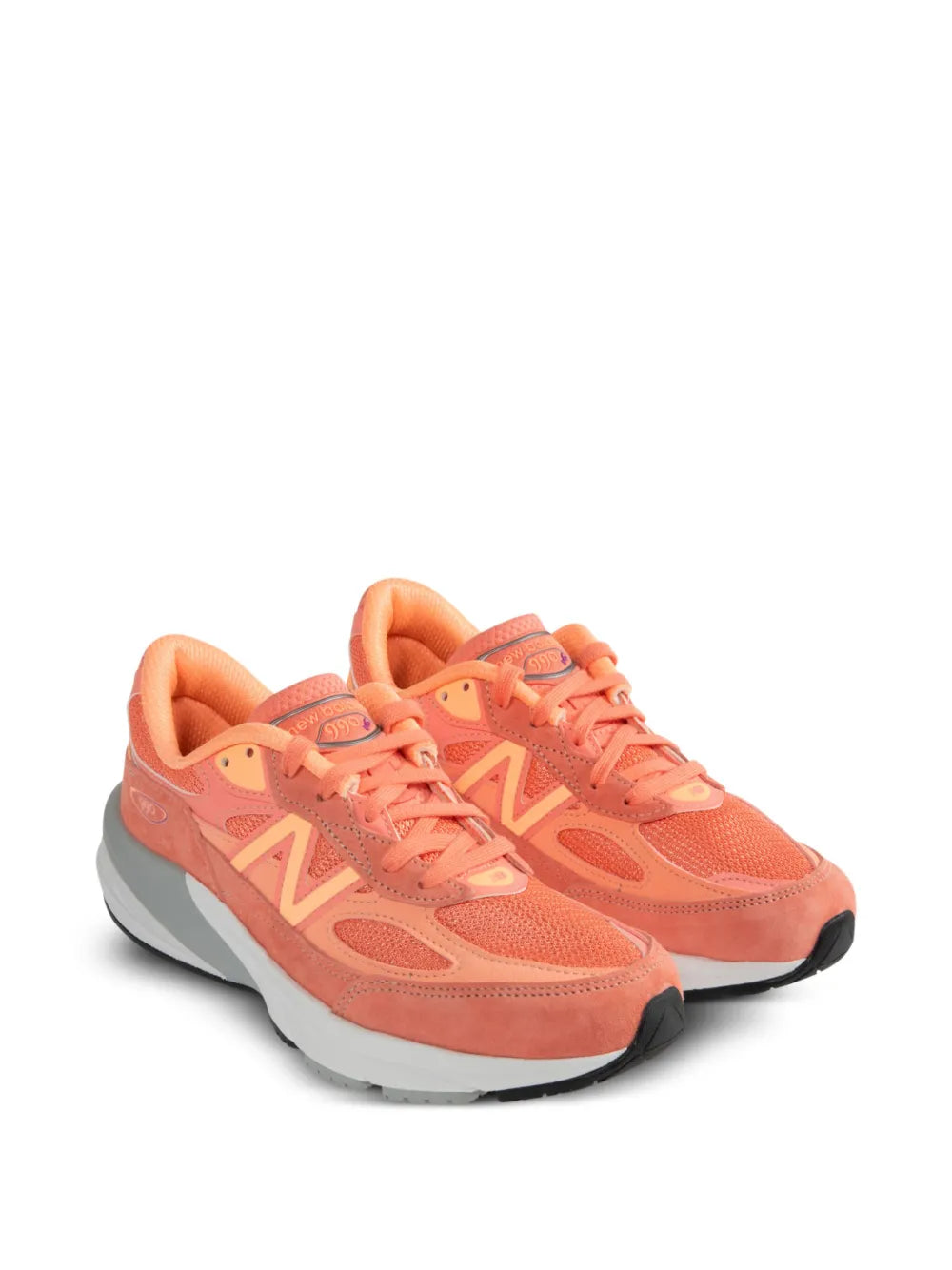 Peach orange New Balance 990V6 sneakers, front/side lace-up styling with gray sole