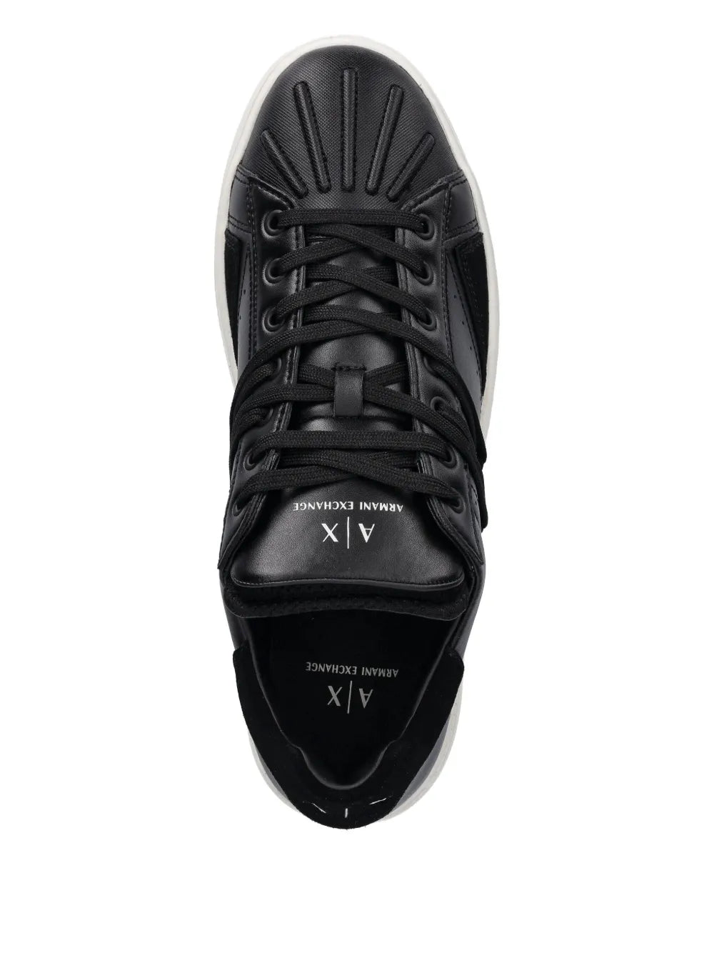 Black low-top sneakers, front view, lace-up with padded tongue