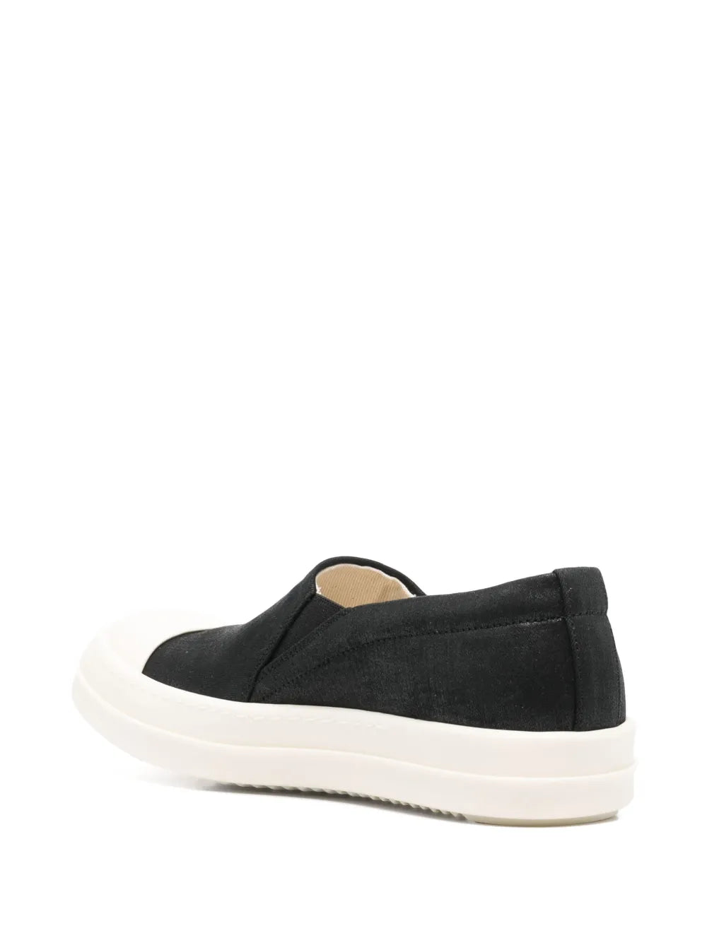 Black slip-on boat sneaker with white sole and padded heel collar