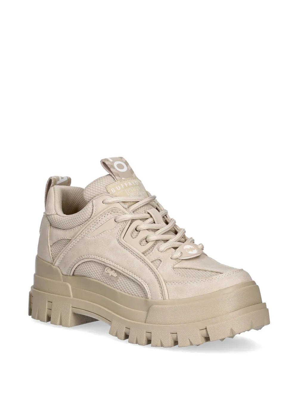 Beige lace-up sneaker with padded collar, stitched overlays, and thick tread sole