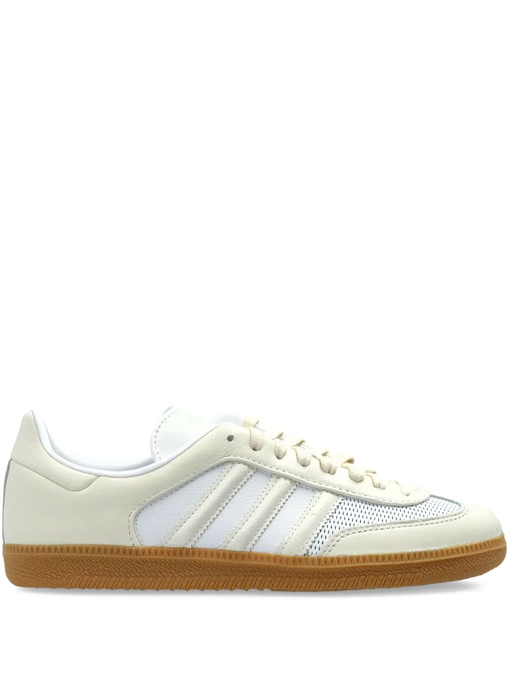 Light beige low-top sneaker with blue adidas-style stripes and gum rubber sole