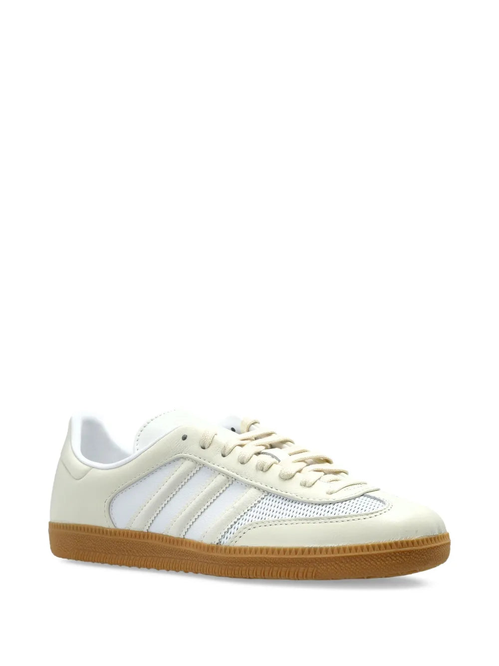Cream and light blue low-top sneaker with lace-up front and gum outsole