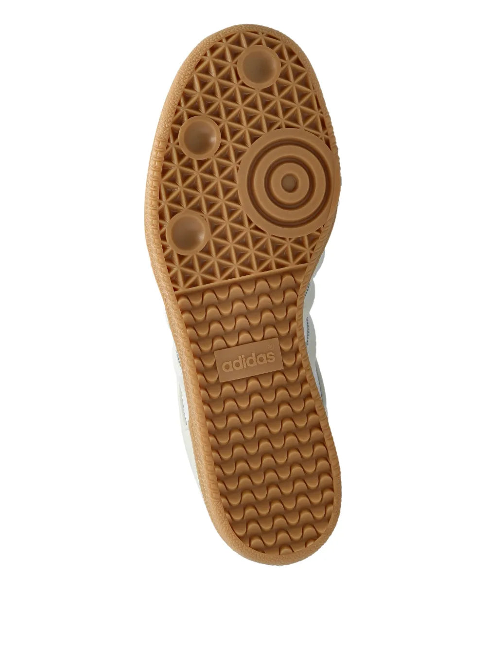 Shoe outsole with textured gum tread and adidas logo on the heel