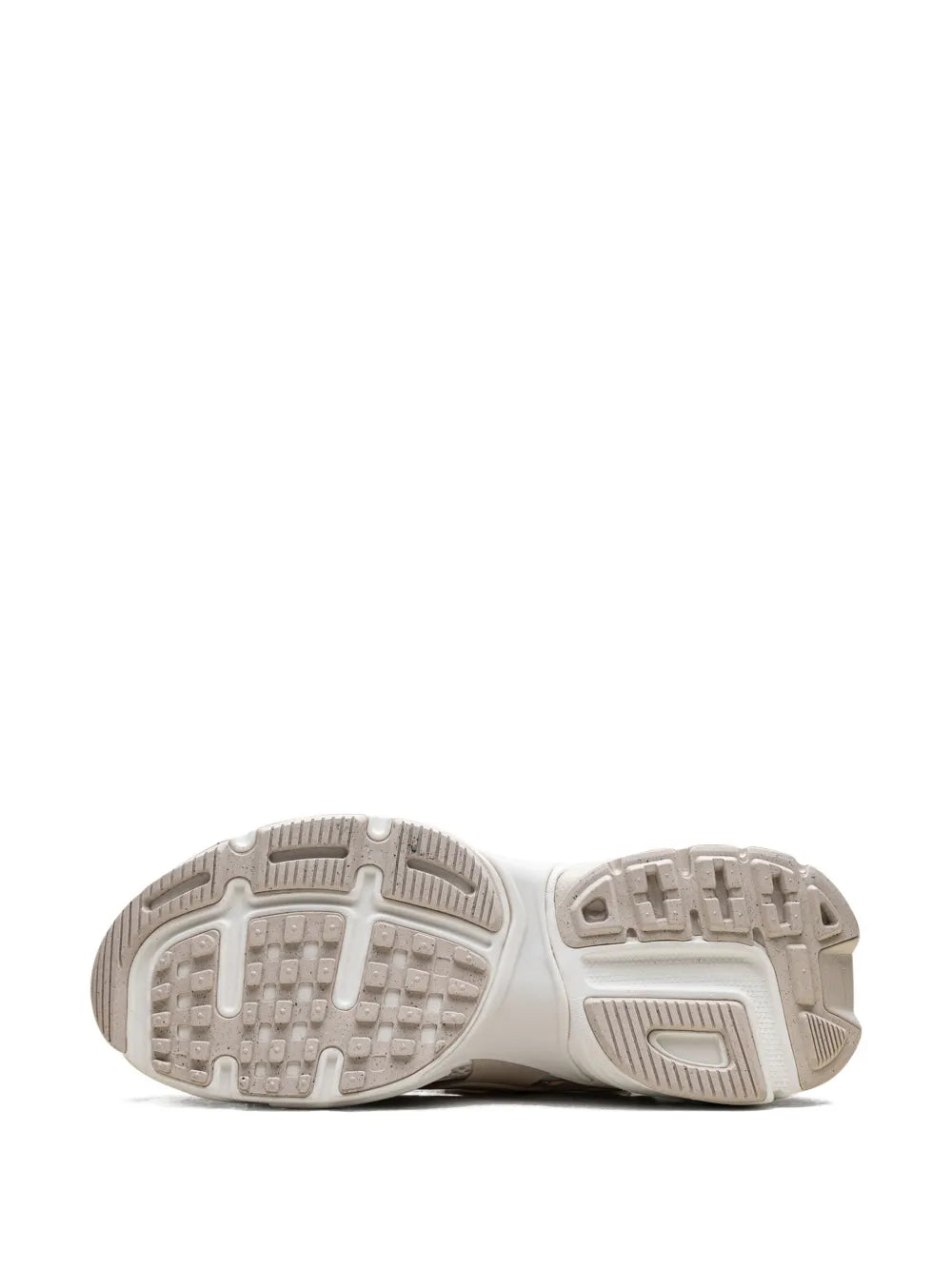 Nike V2K Run sneaker outsole with textured rubber tread, beige and white
