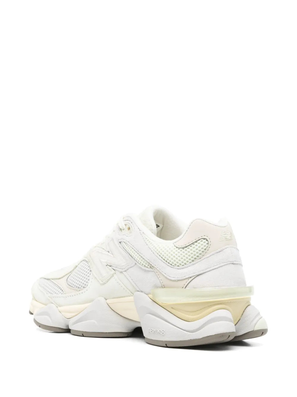 Ecru New Balance 9060 sneakers, heel view with layered midsole and mesh upper