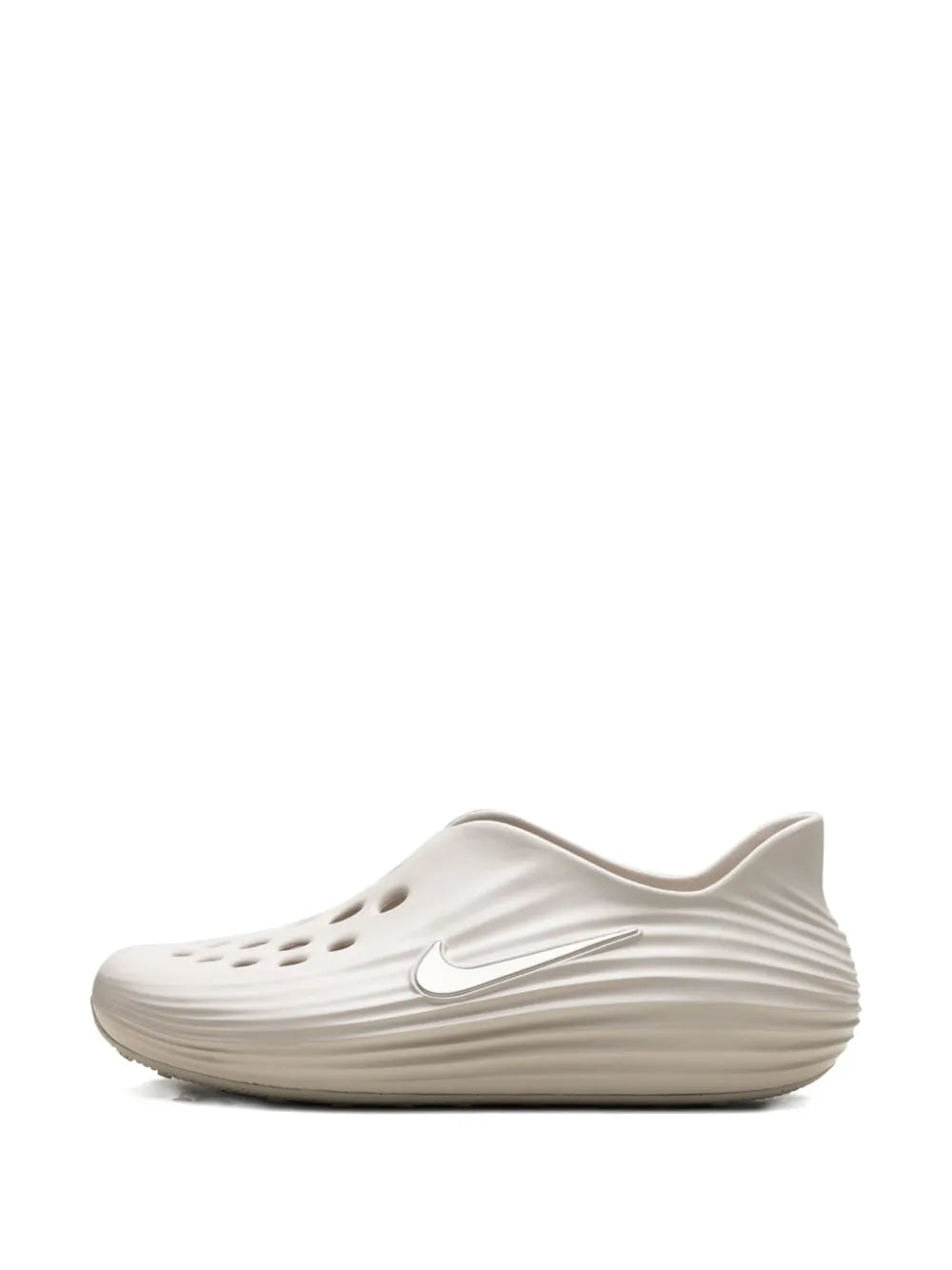 Nike slip-on running shoe, light beige with toe perforations and side swoosh