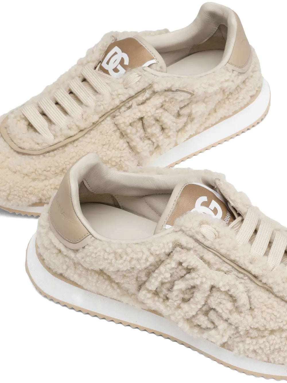 Beige shearling sneakers close-up of laces, textured fleece, DG emblem on tongue