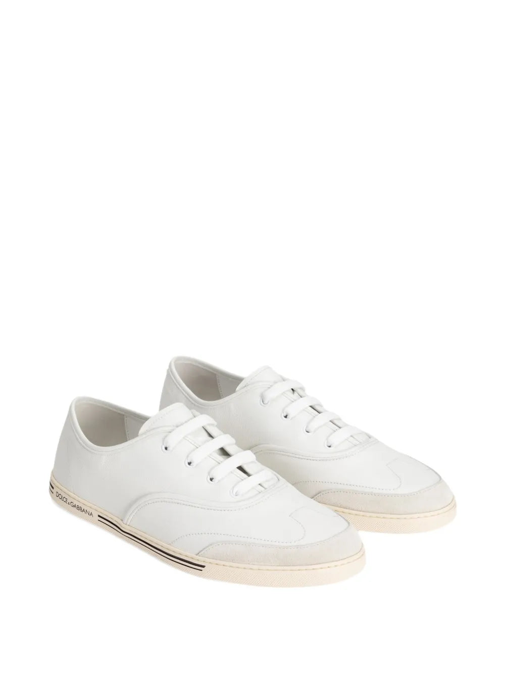 White lace-up leather trainers, shown as a pair