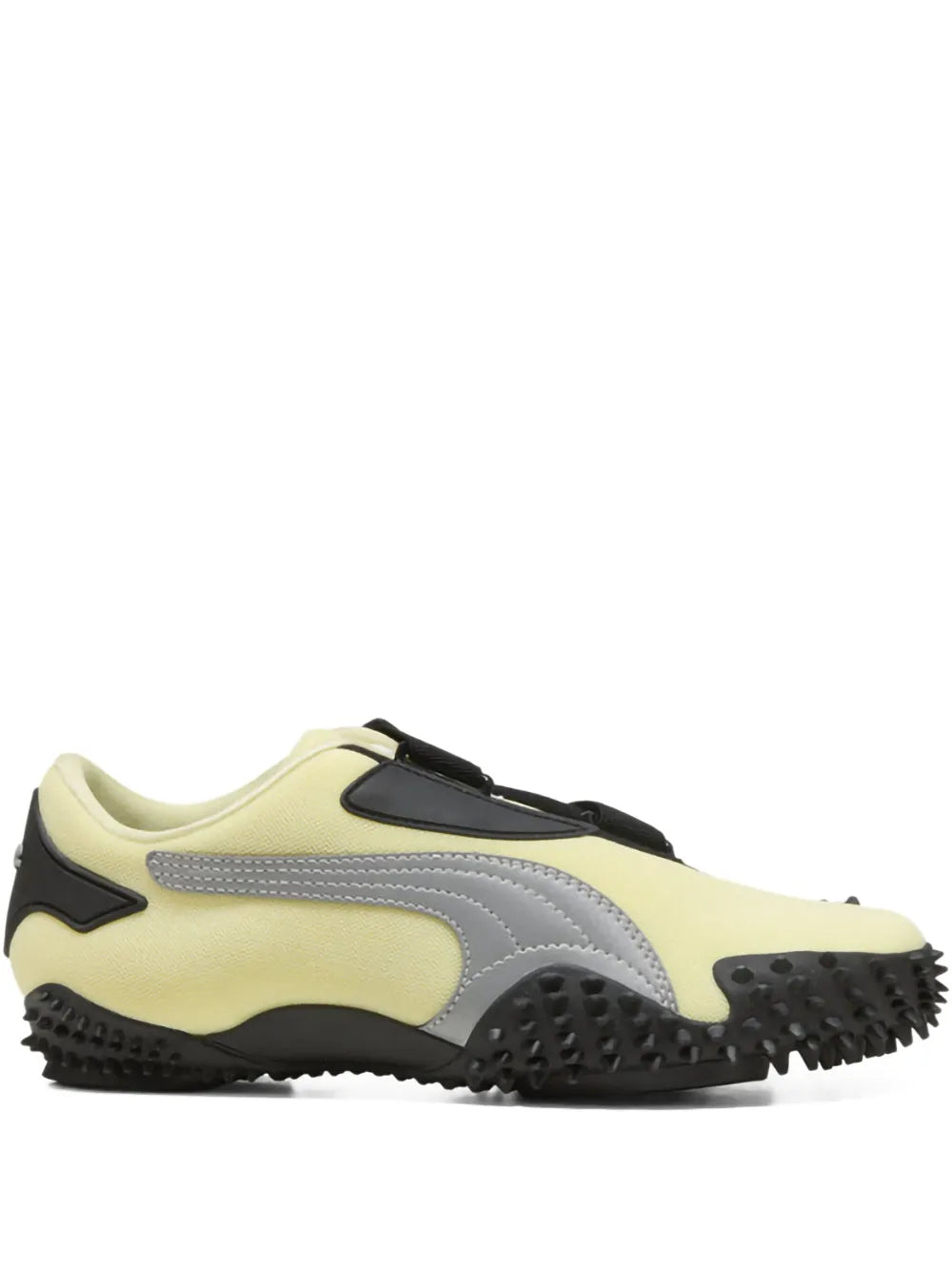 PUMA Mostro Og sneaker in yellow/cream with black and gray panels, lace-up.