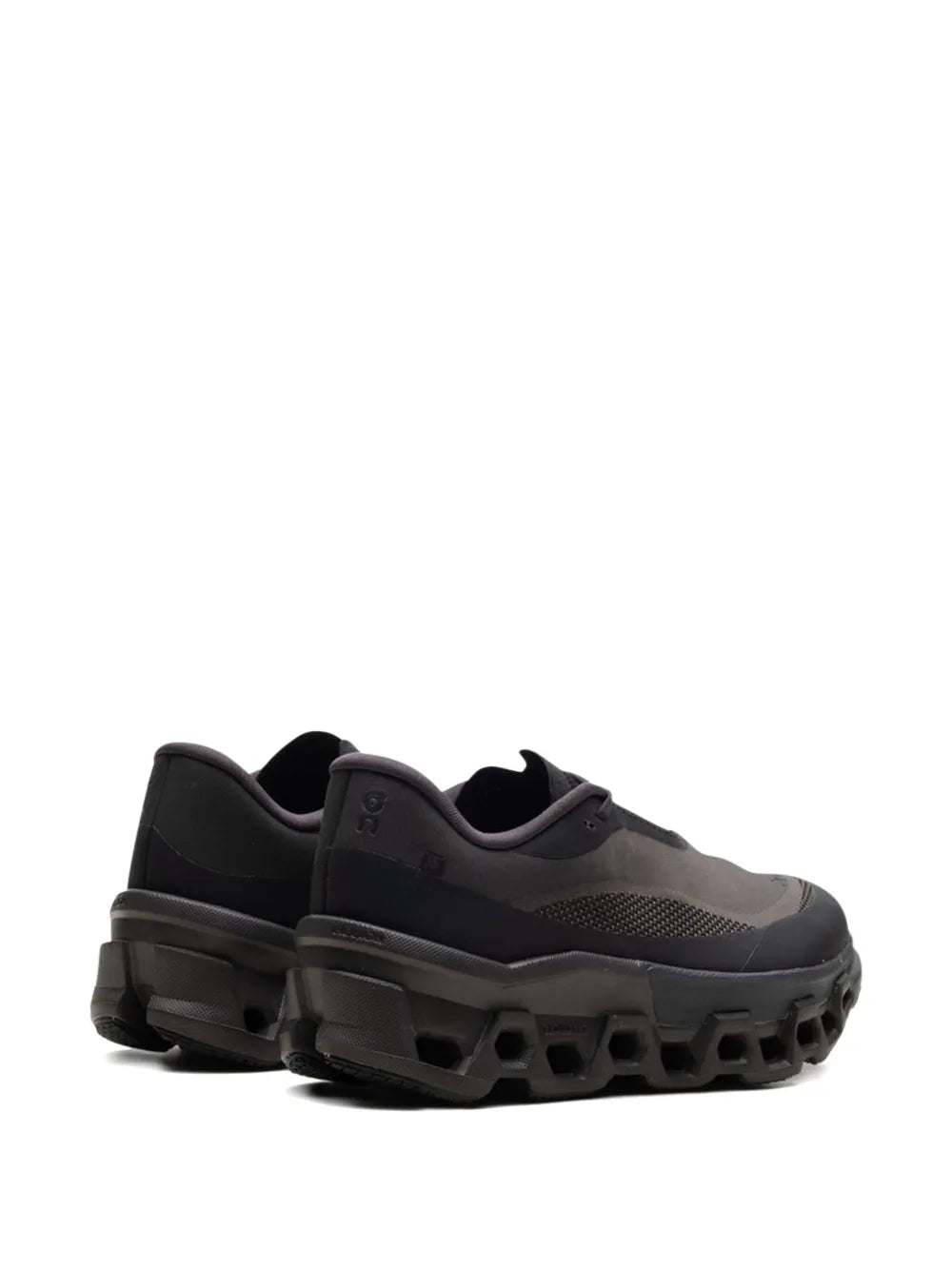 On Cloudmonster 2 women's running shoes, heel view, cushioned thick sole and lace closure