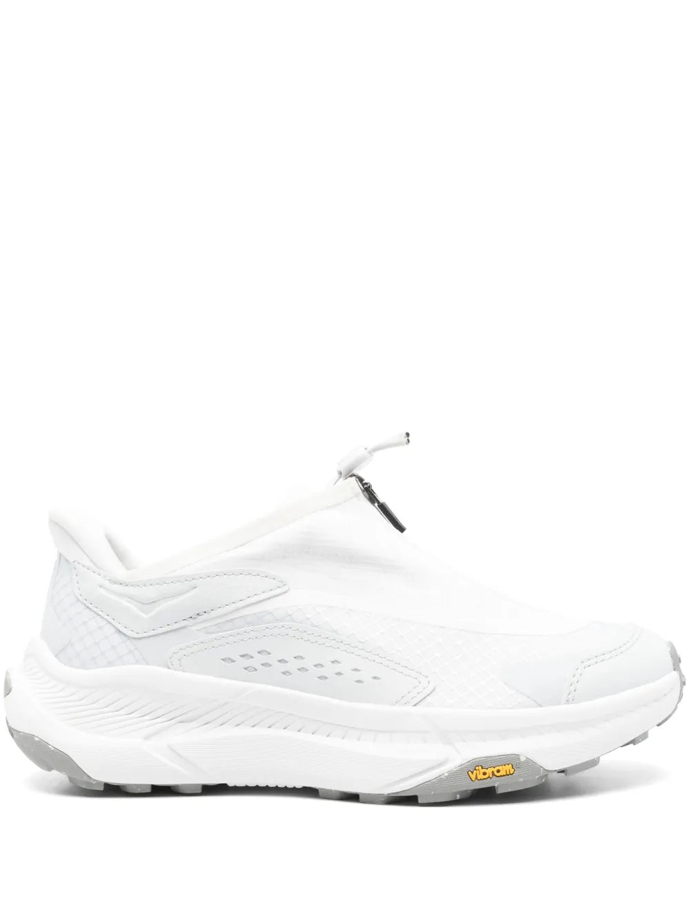White Hoka sneakers with black lace hook and grippy outsole detail