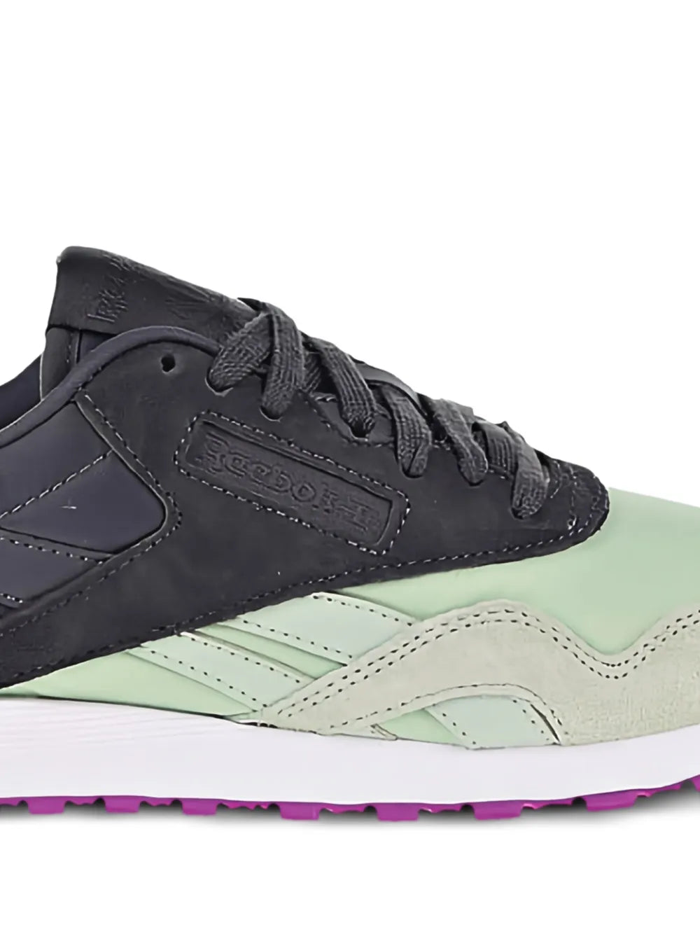 Reebok Classic nylon sneakers close-up, black leather with mint side panels