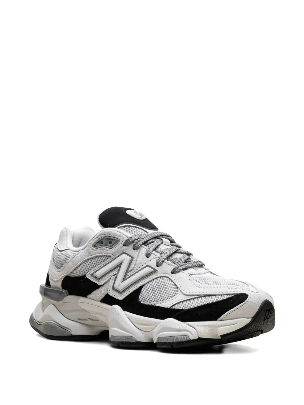 Light grey and black lace-up sneakers, side profile with logo and chunky midsole