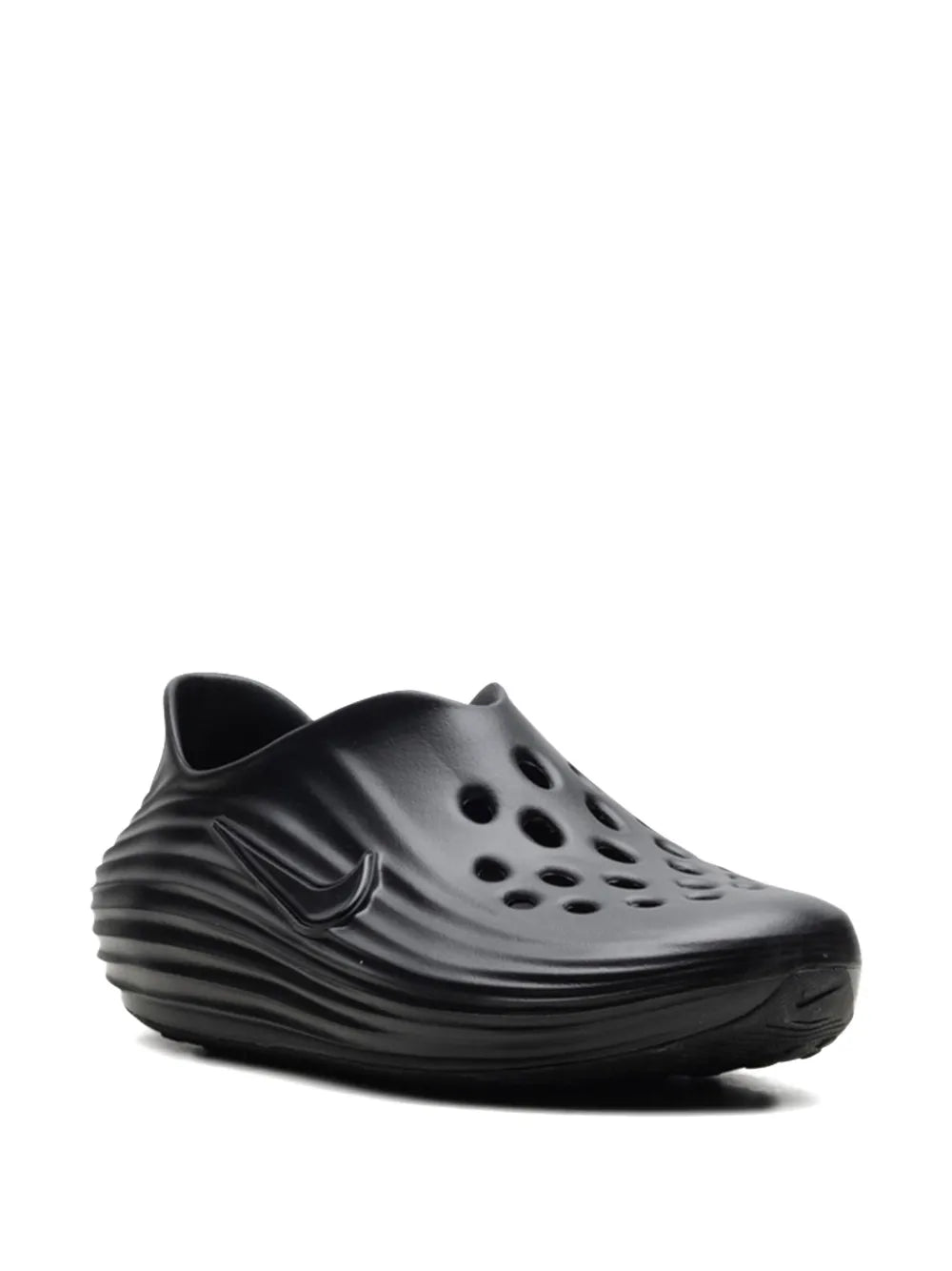 Women's black slip-on clog shoe, side view with Nike Swoosh and holes