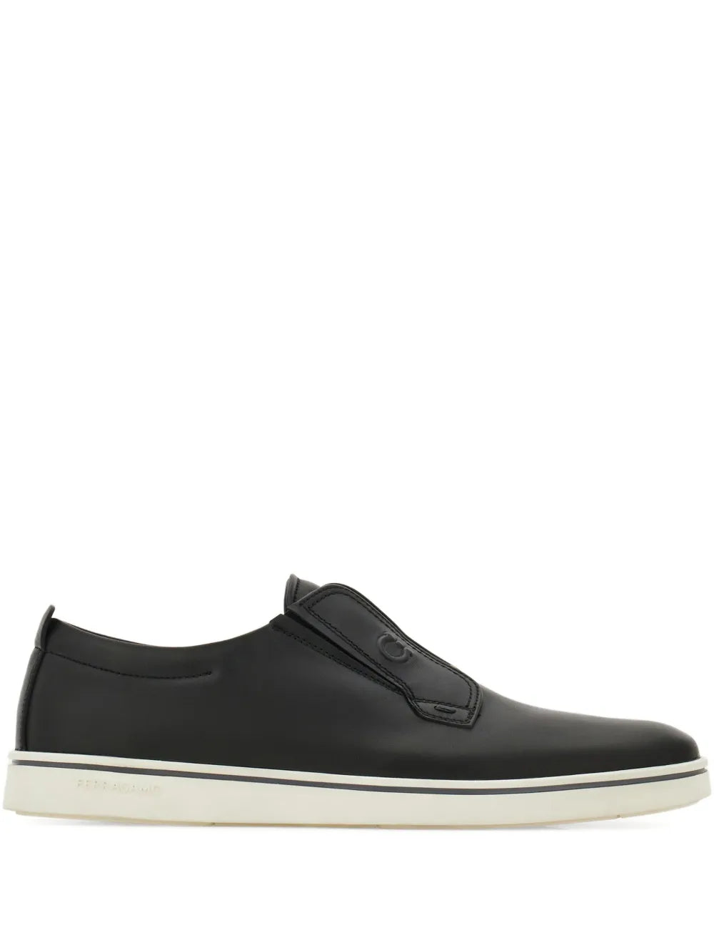 Ferragamo black leather slip-on sneakers with strap detail and white rubber sole