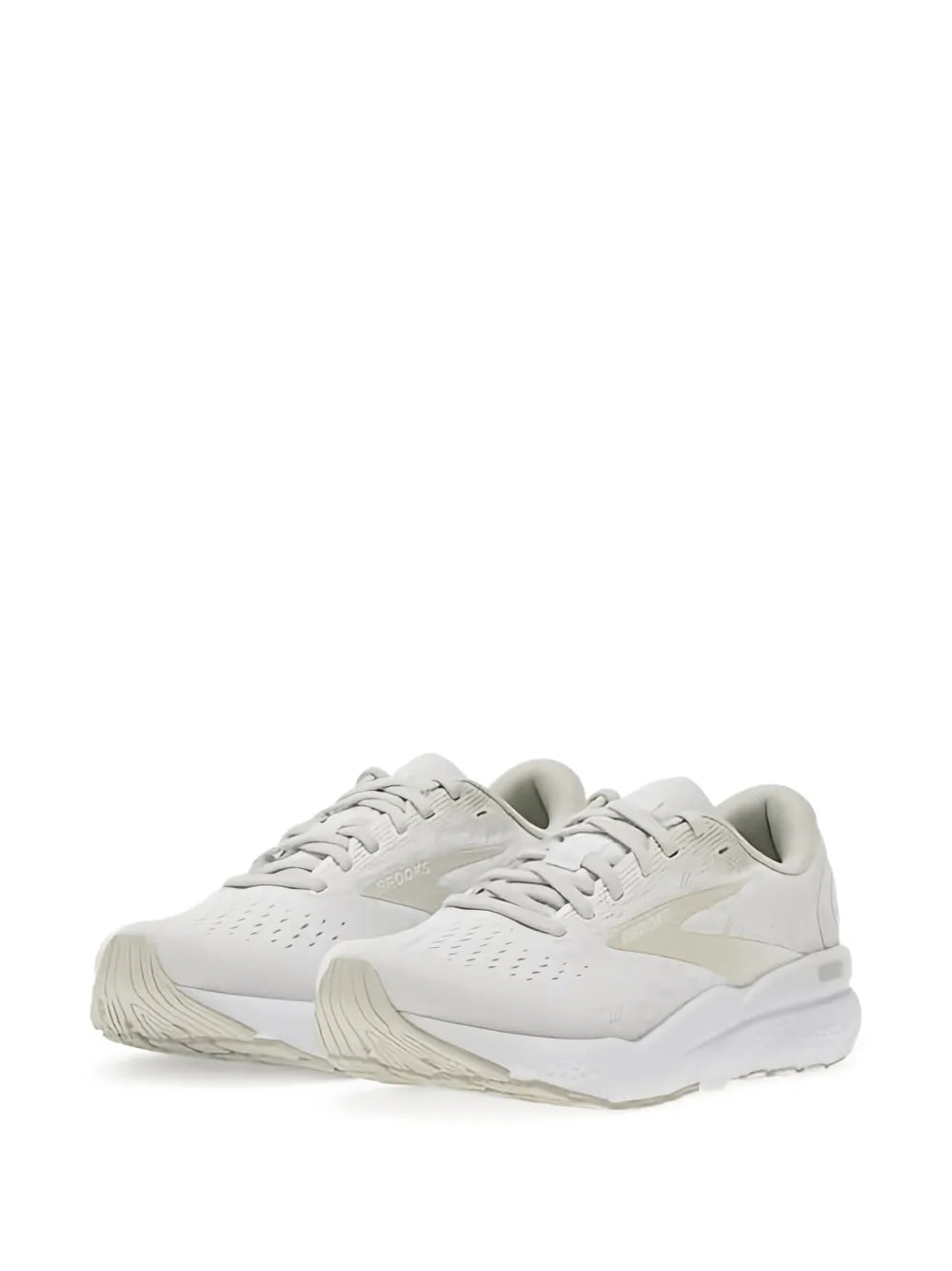 White lace-up running shoes with beige logo patch and padded collar