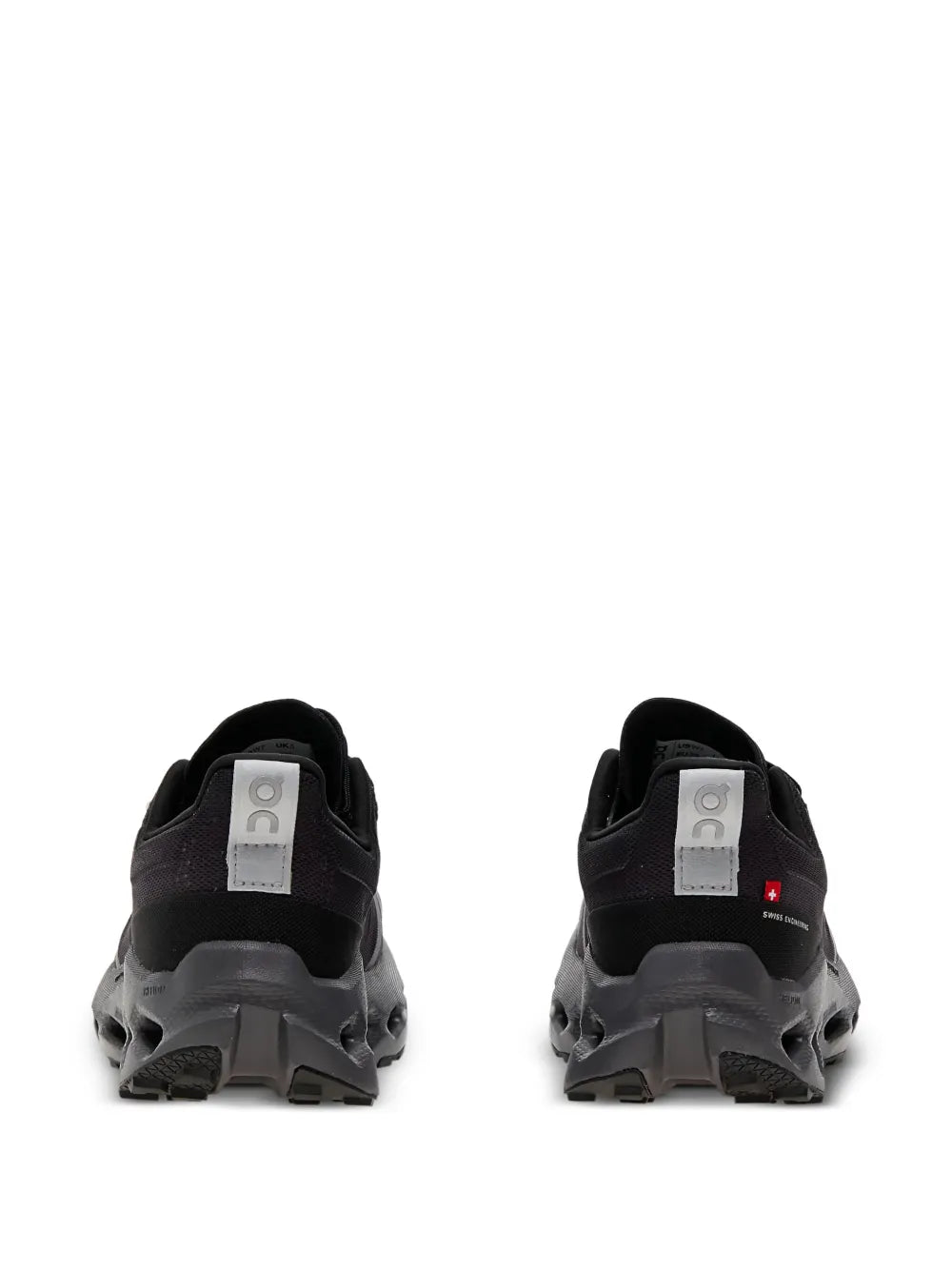 Trail shoes, dark black rear view with padded heel and loop pull tabs