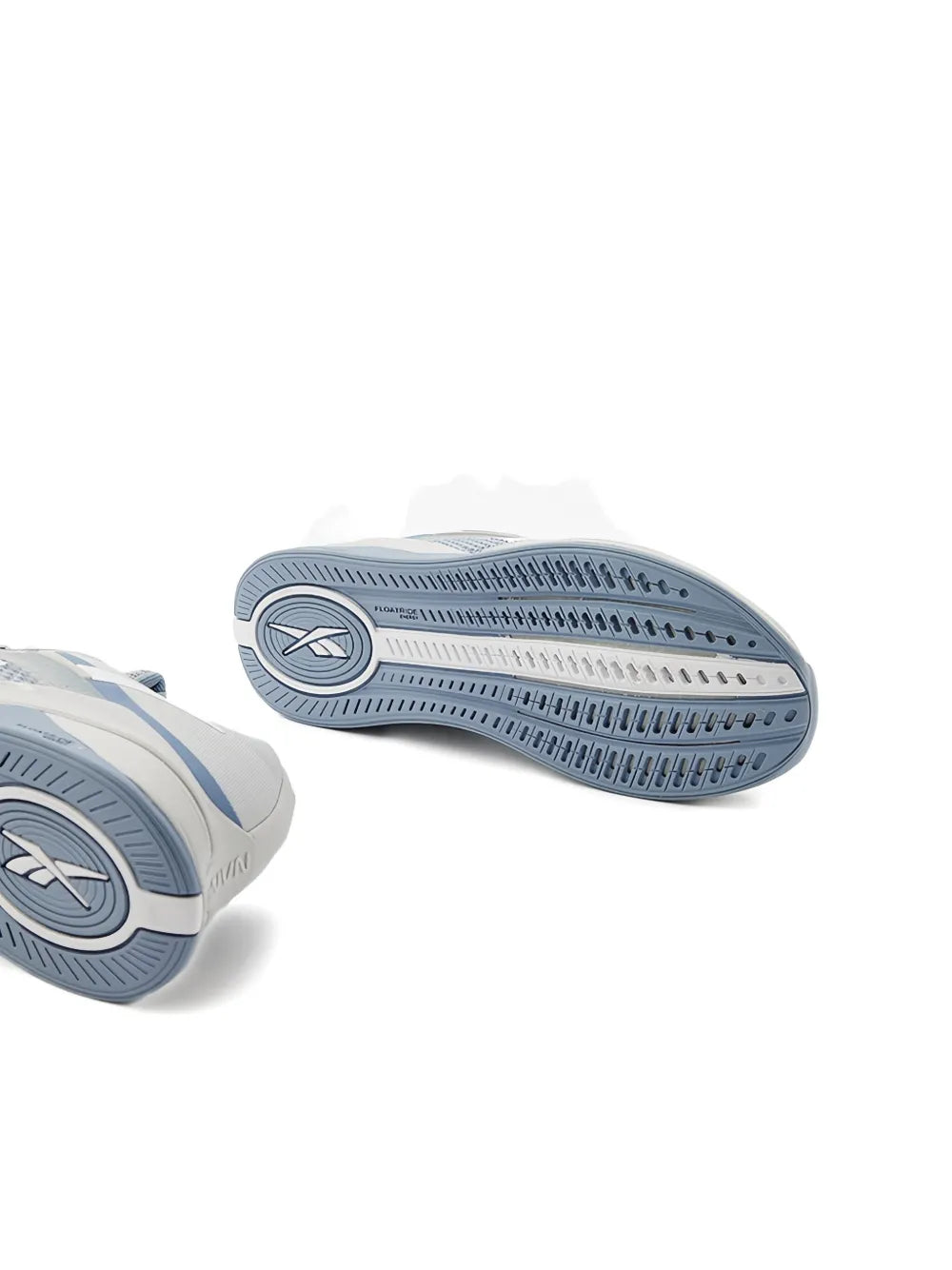 Reebok Nano X4 outsole and toe area, textured rubber traction, blue tread