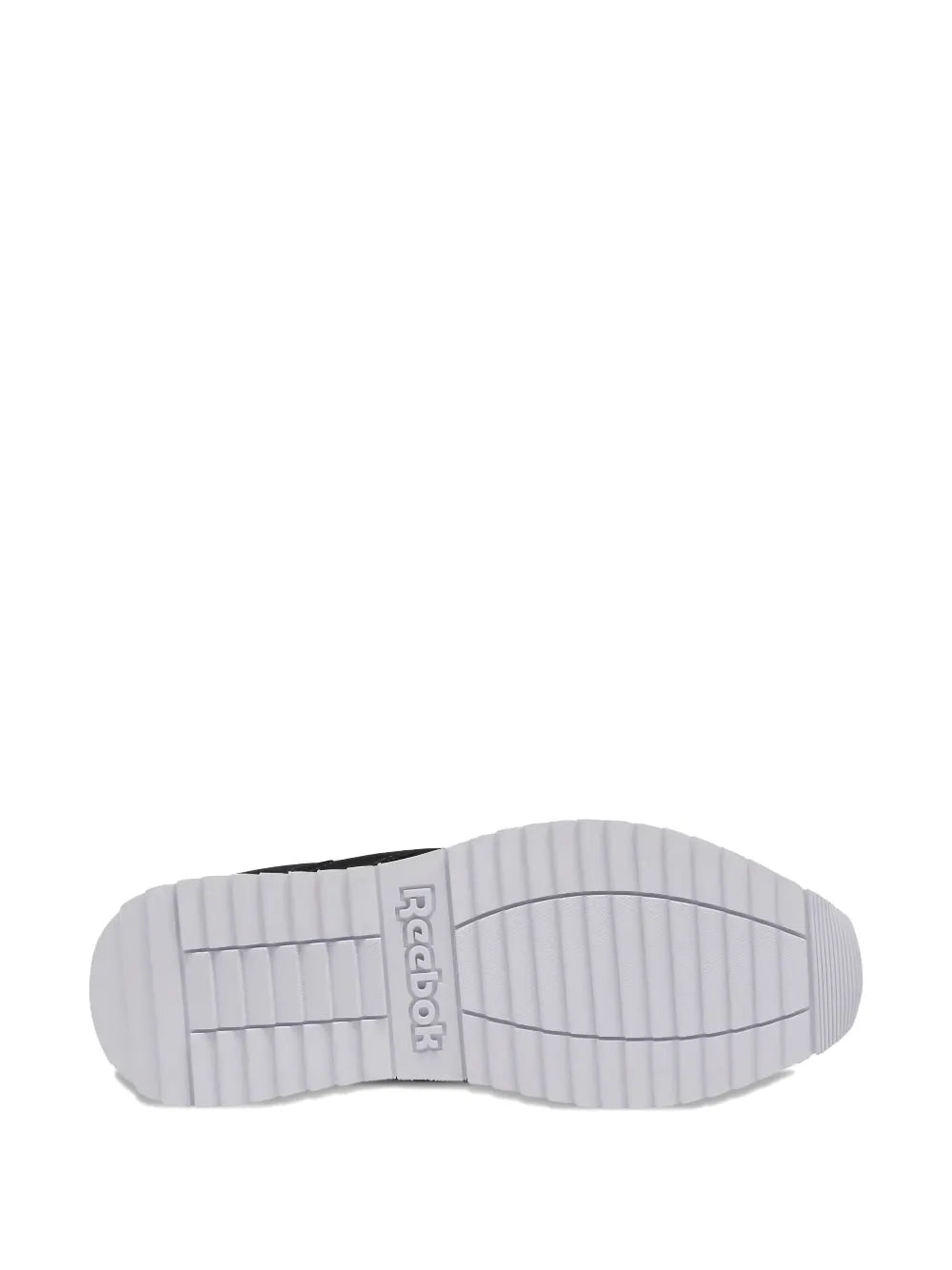 Black sneaker outsole with Reebok logo and thick white rubber traction tread
