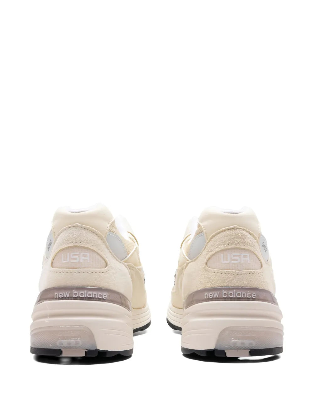 Pair of off-white sneakers showing USA heel labels and padded collar