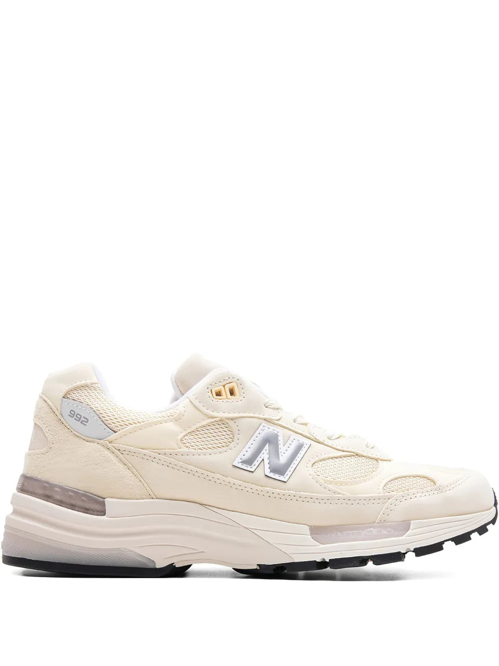 Off-white running sneakers with N logo and USA badge on heel
