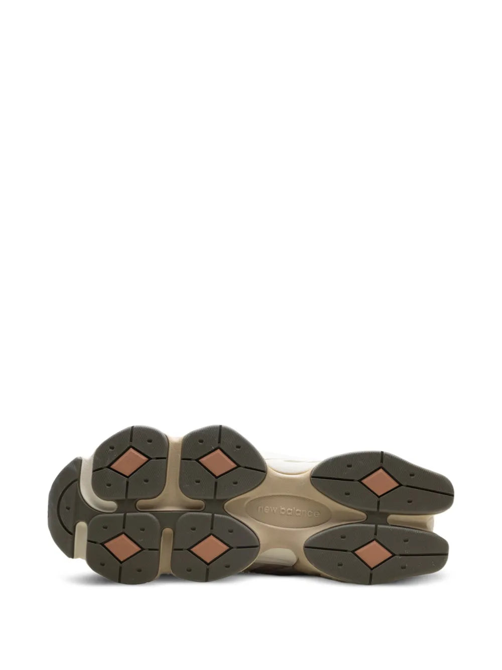 New Balance 9060 sneaker outsole, dark traction pods on beige platform sole